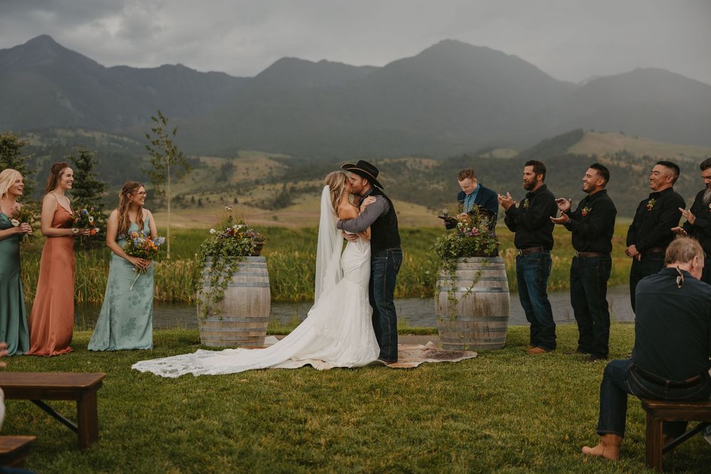 Ceremony at Copper Rose Ranch on her rainy wedding day in Pray, Montana Paradise Valley captured by Livingston, Montana Wedding photographer