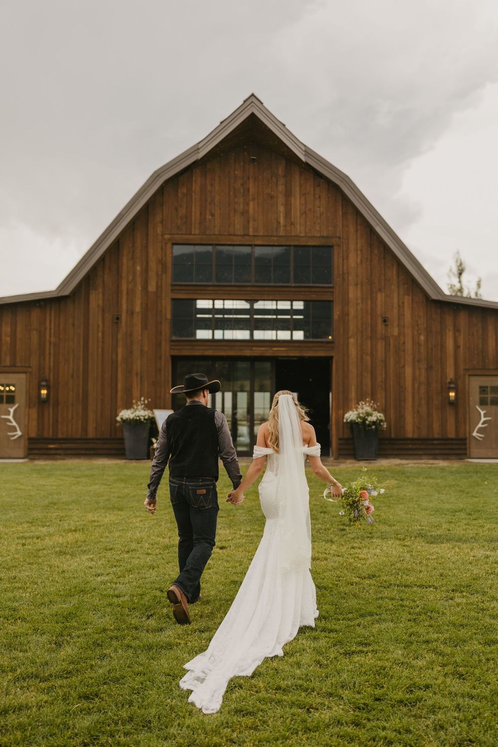 Ceremony at Copper Rose Ranch on her rainy wedding day in Pray, Montana Paradise Valley captured by Livingston, Montana Wedding photographer