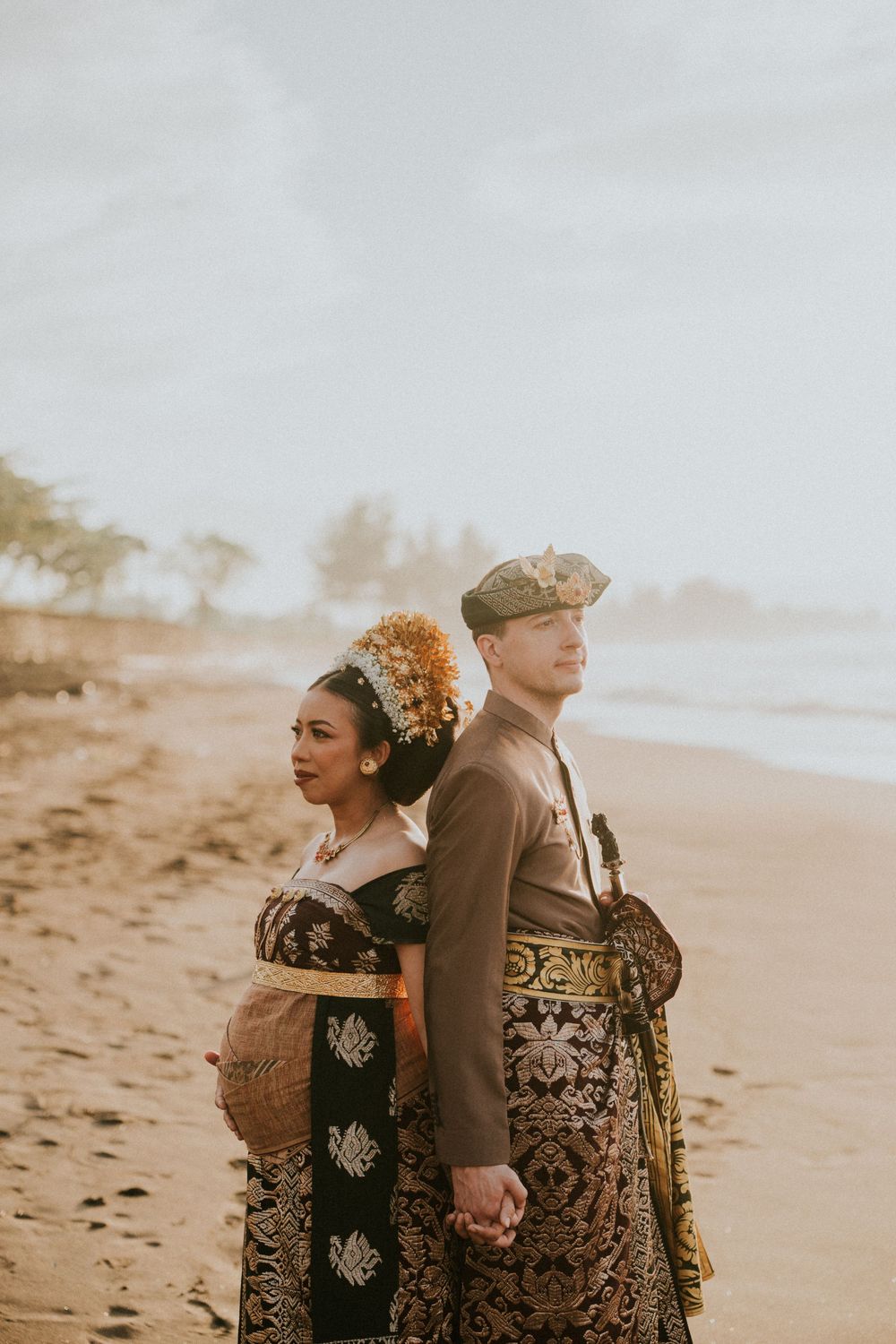 Maternity photography session with Balinese attire on Saba Beach Bali.