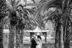 Palm trees line a tropical pathway creating a natural wedding ceremony aisle.