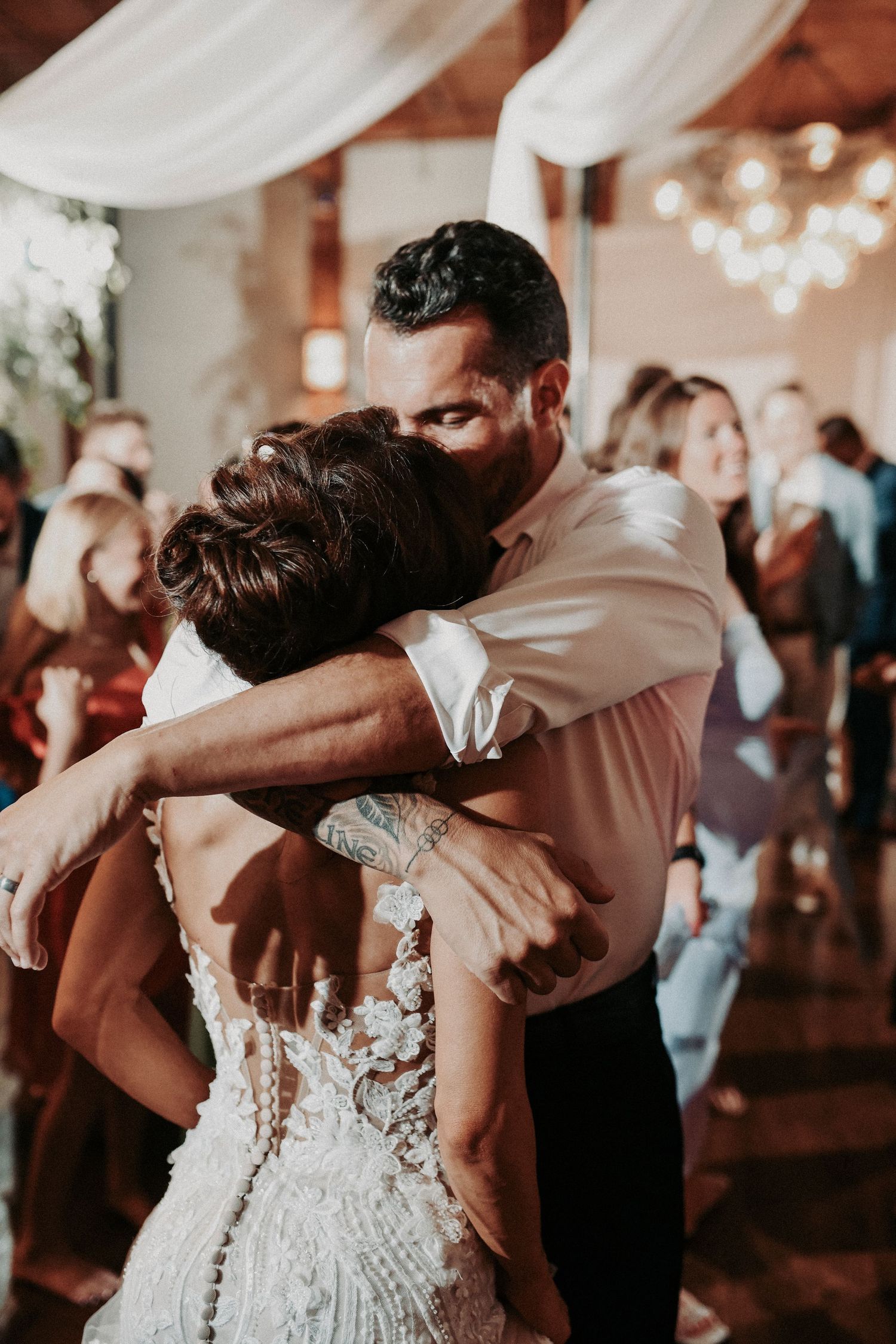 Megan dancing with family during her wedding reception