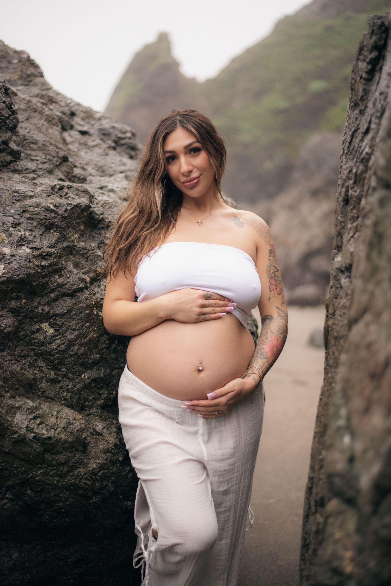 Sonoma Coast maternity photographer capturing cinematic beach maternity photos with natural light, ocean views, + beautiful, intimate moment