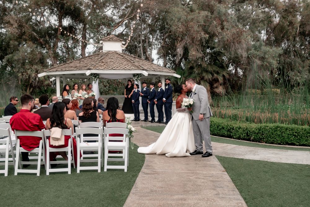 Bride and groom getting marrid at The Orchard by Wedgewood Weddings in Menifee, California
