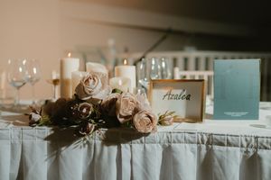 Elegant wedding table with blush roses, white candles, wine glasses at Boyne Hill House Estate, Co.Meath