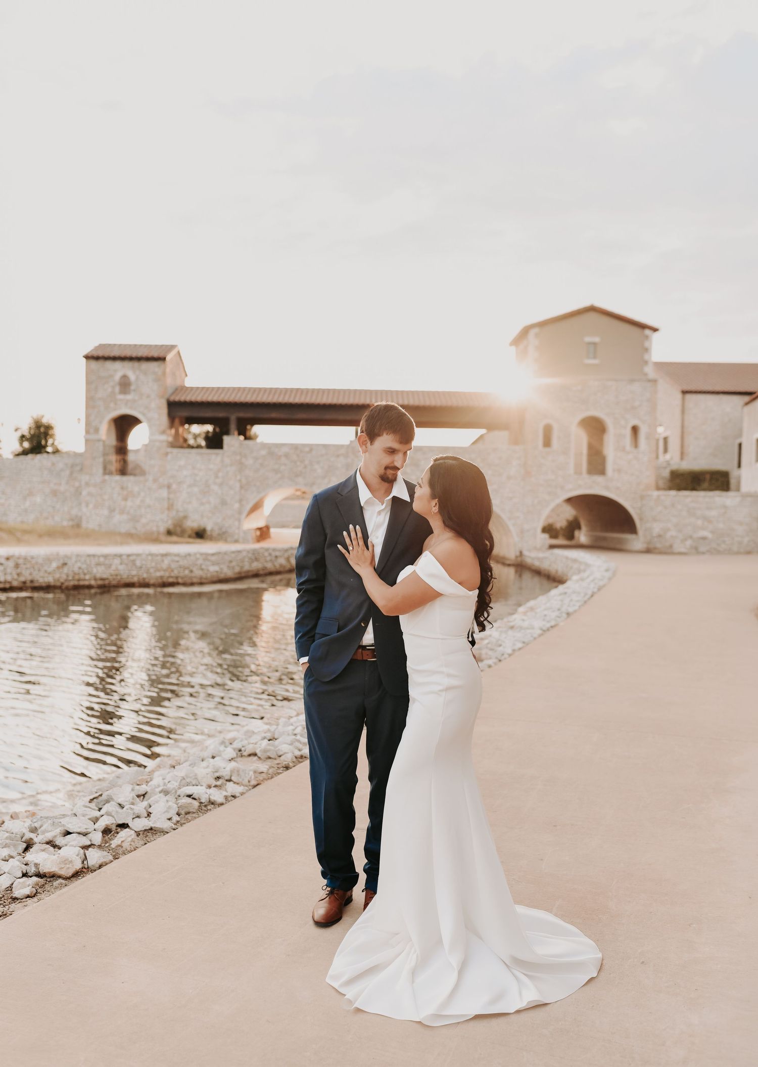 Couple dressed in white and navy for an elevated North Texas engagement photography session