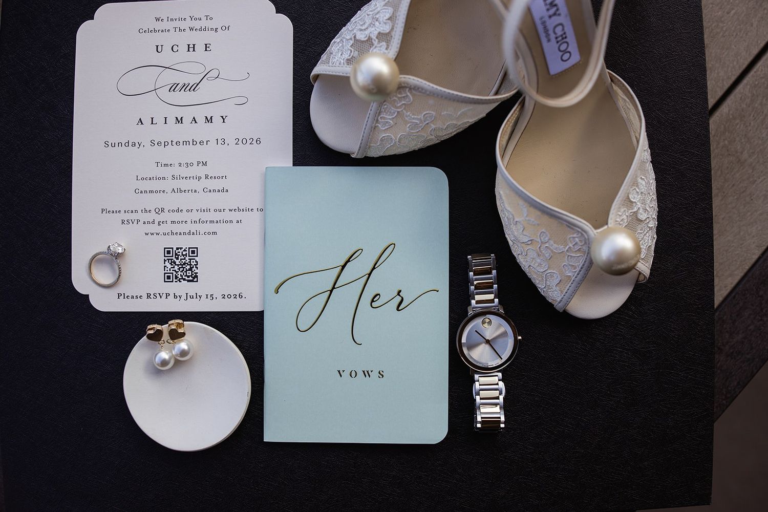 Wedding invitation flat lay for a Silvertip Resort wedding