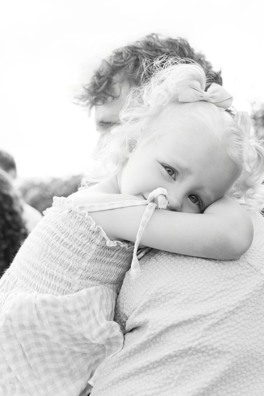Black-and-white family beach portrait from a Jekyll Island photography session.