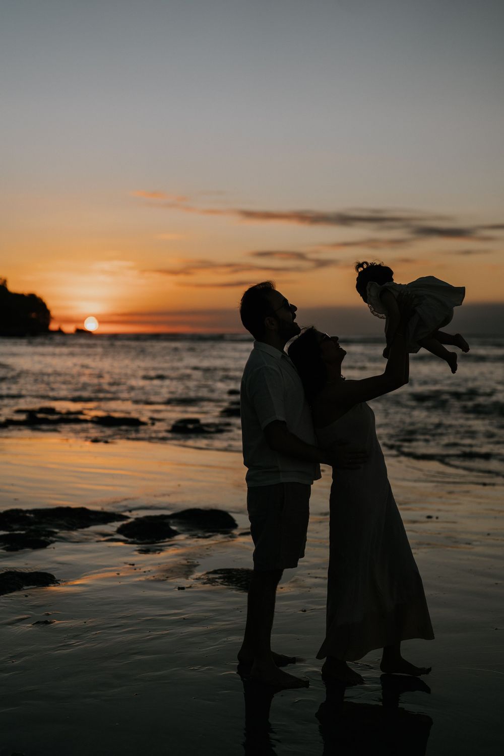 Natural sunset family portrait at Muaya Beach Jimbaran