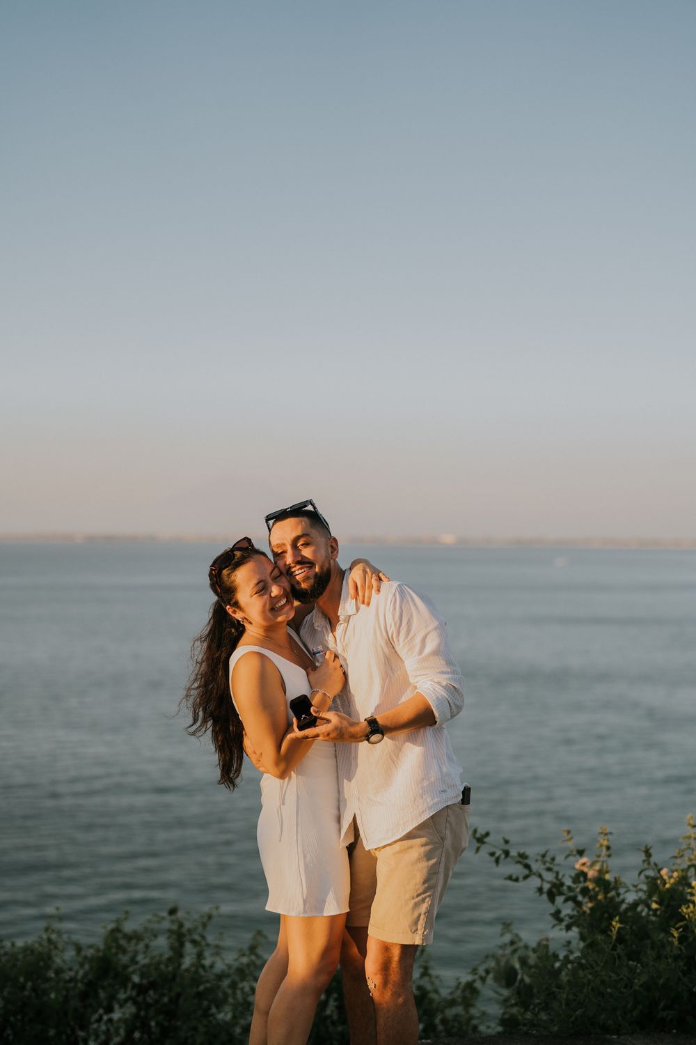 Secret proposal photography at Balangan Beach during sunset in Bali.