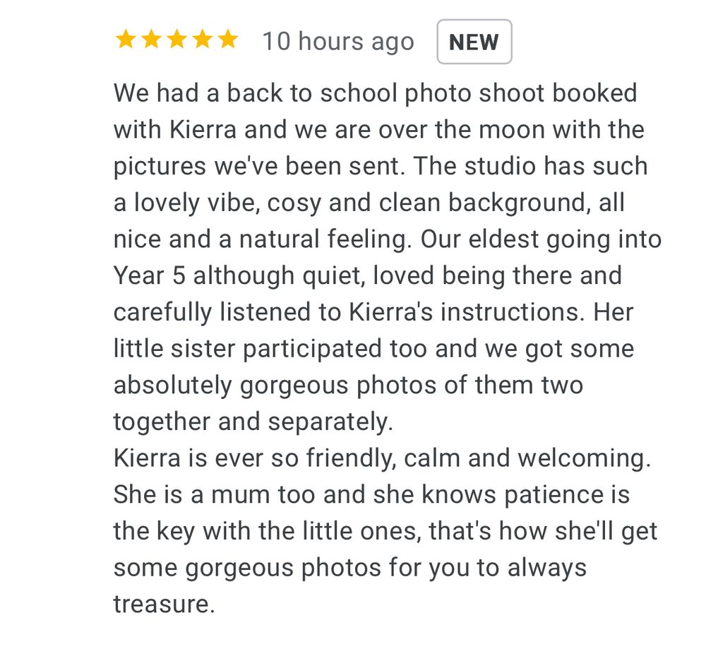 Five-star customer review praising Kierra's photography studio for back-to-school photo shoot with natural backgrounds and patient service.