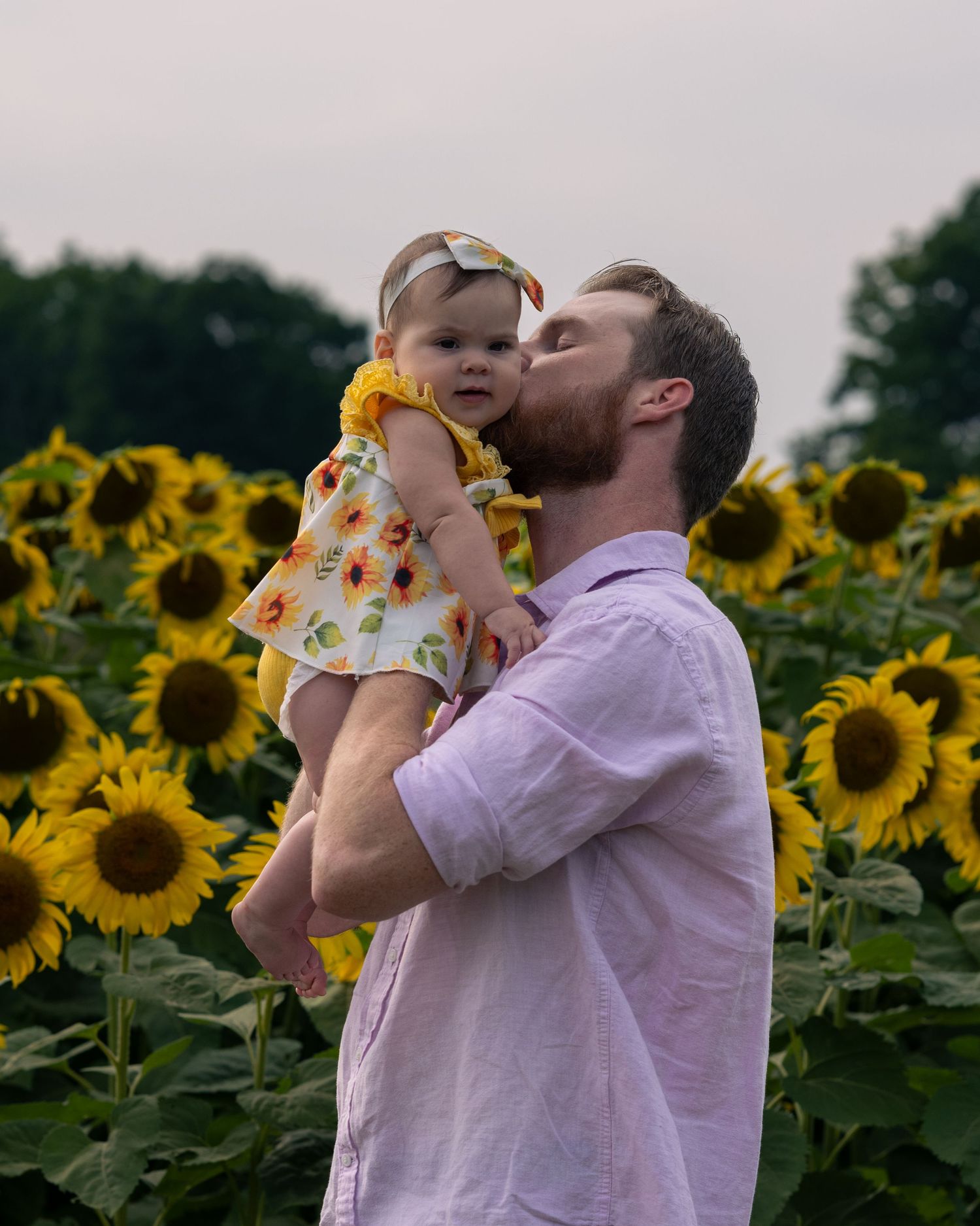 Dad and baby at family Sunflower Mini Session in New Hampshire