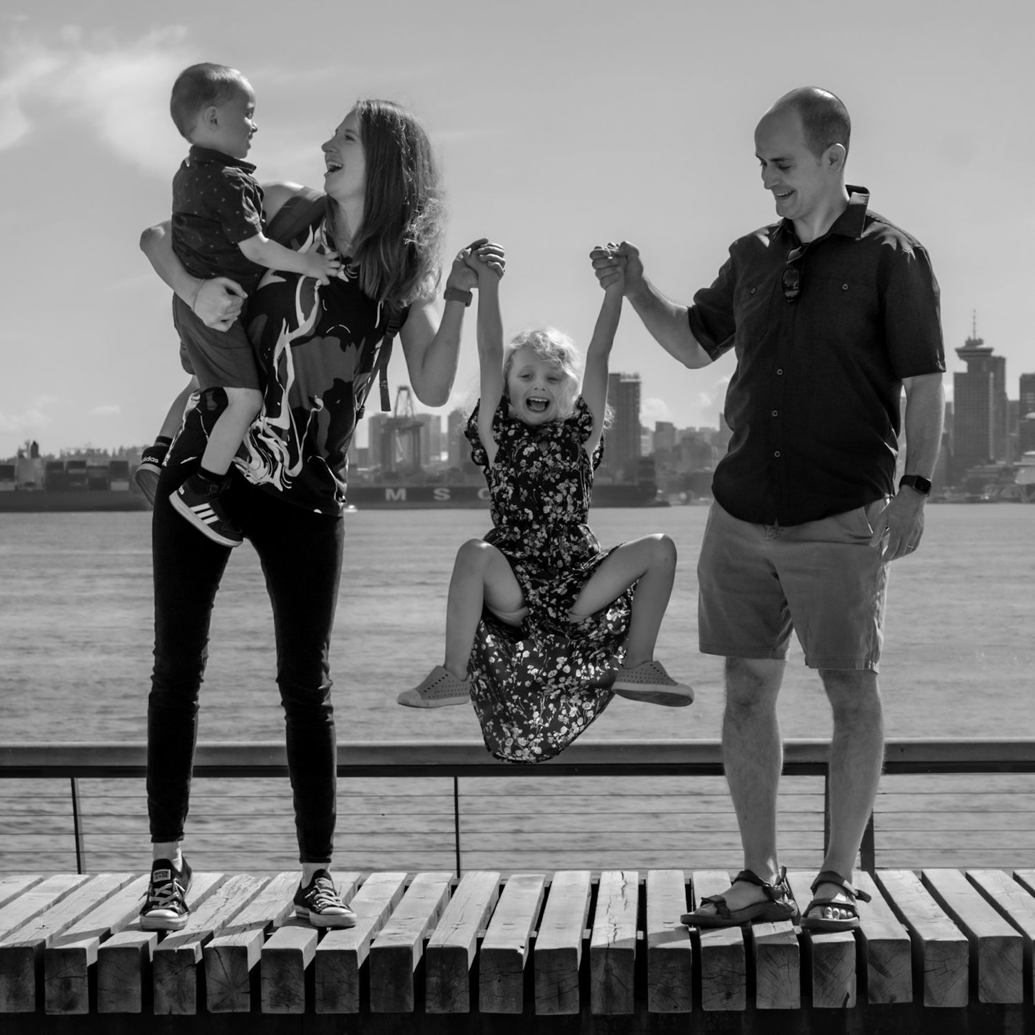 Family portrait session at North Vancouver Shipyards, near Lonsdale, fun active natural light photography