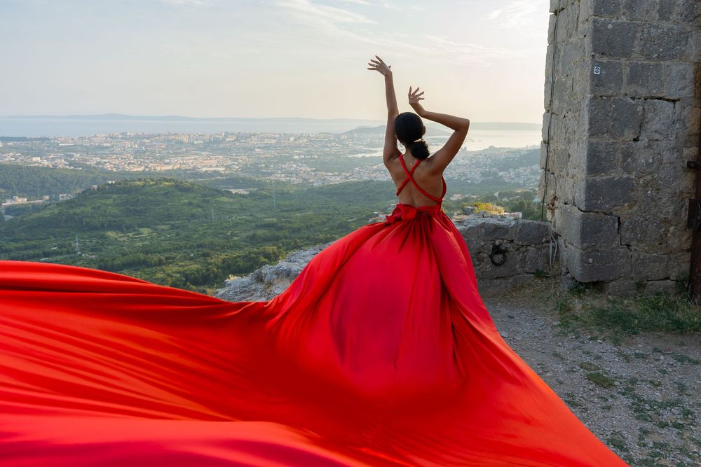 Red Flying dress photo session in KLIS CROATIA