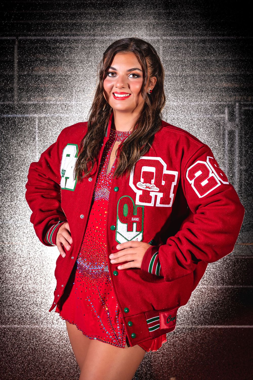 High school senior athlete wearing varsity jacket – bold senior portrait Ohio