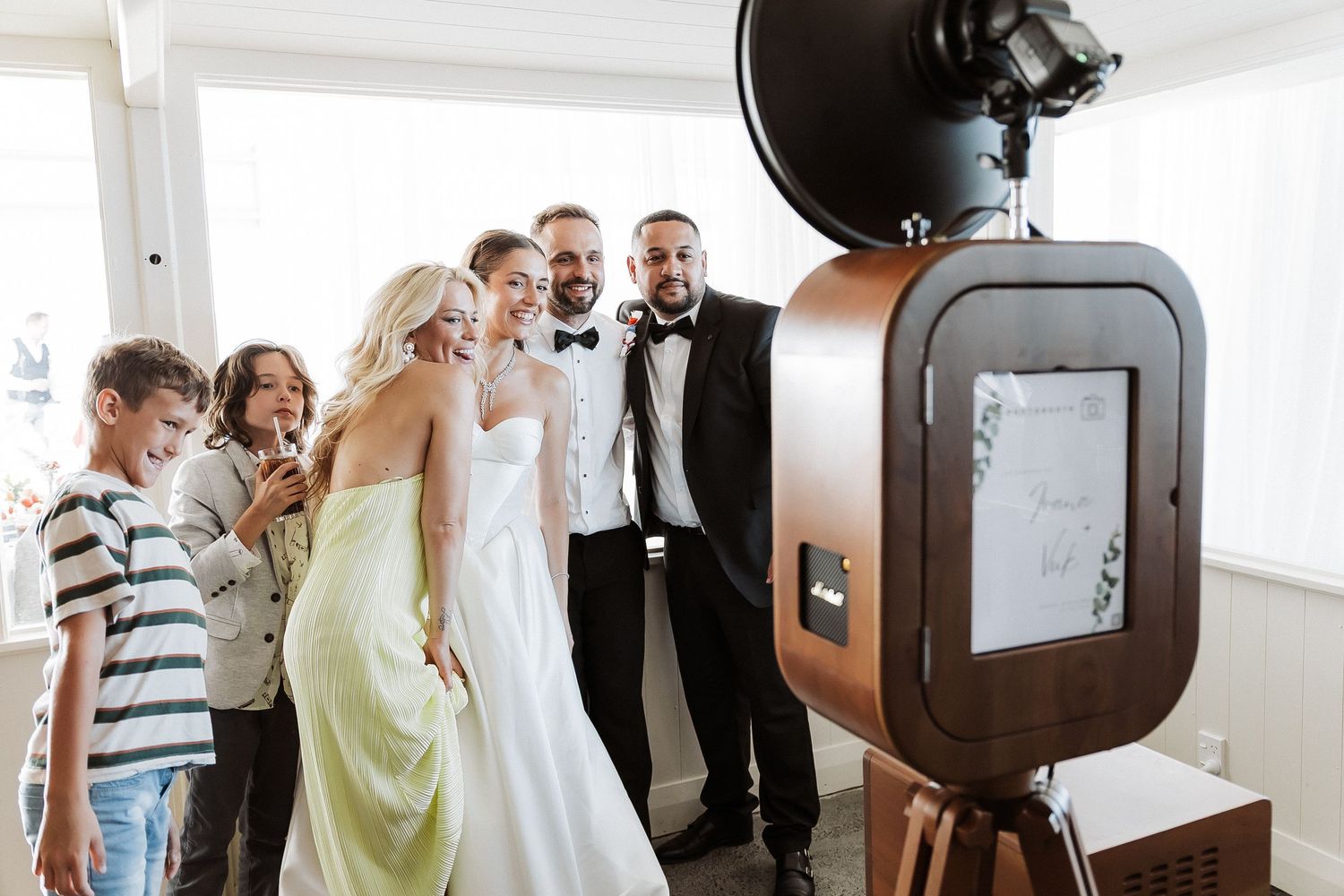 Wedding Guests using photobooth during the reception at Allely Estate