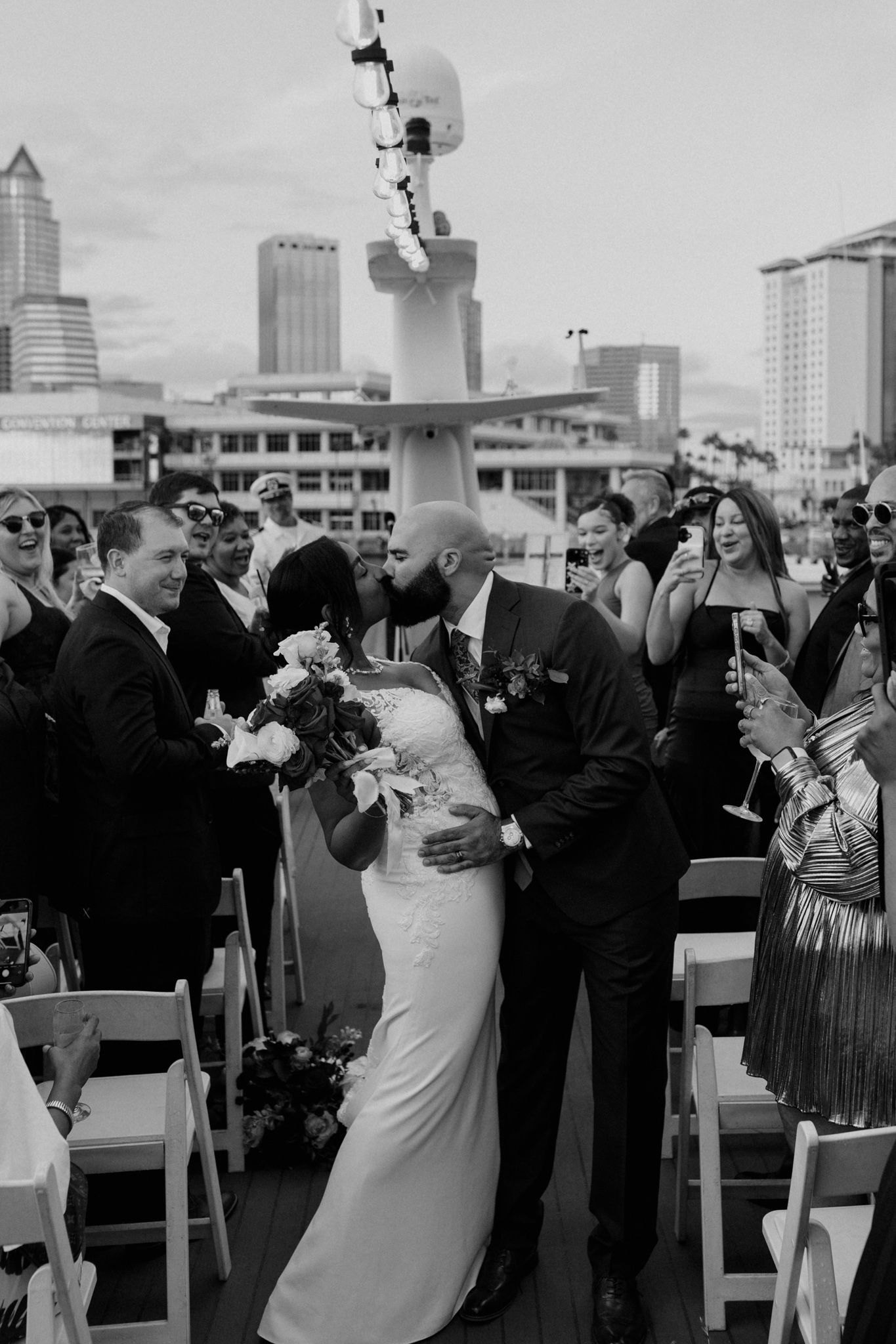 Boat wedding reception celebration with city skyline backdrop Orlando, Florida