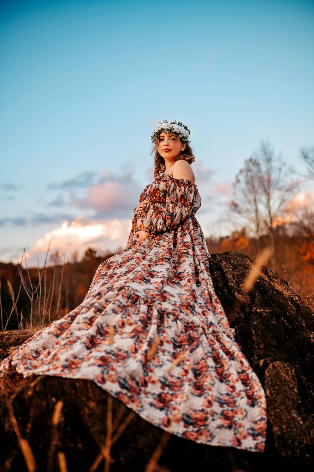 A flowing floral dress twirls gracefully against a sunset sky in a series of dynamic motion shots.