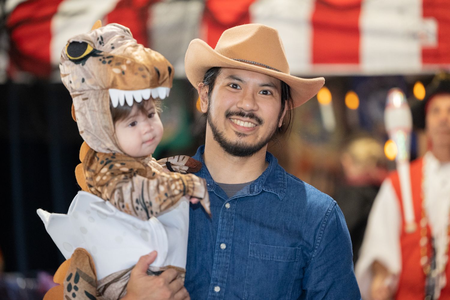 Festive gathering with people wearing costumes and pirate hats at a themed celebration.