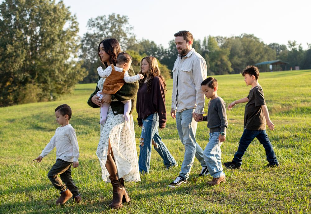 Family photography sessions capturing authentic moments, milestones, and connection. Serving families with natural, stress-free photos.
