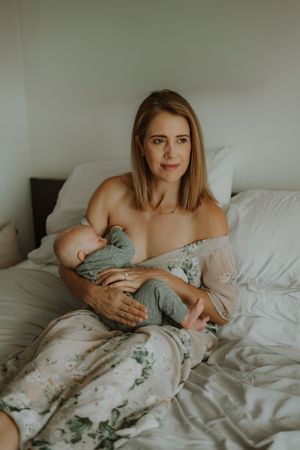 A series of intimate lifestyle photos showing a person resting on white bedding with floral print textiles.