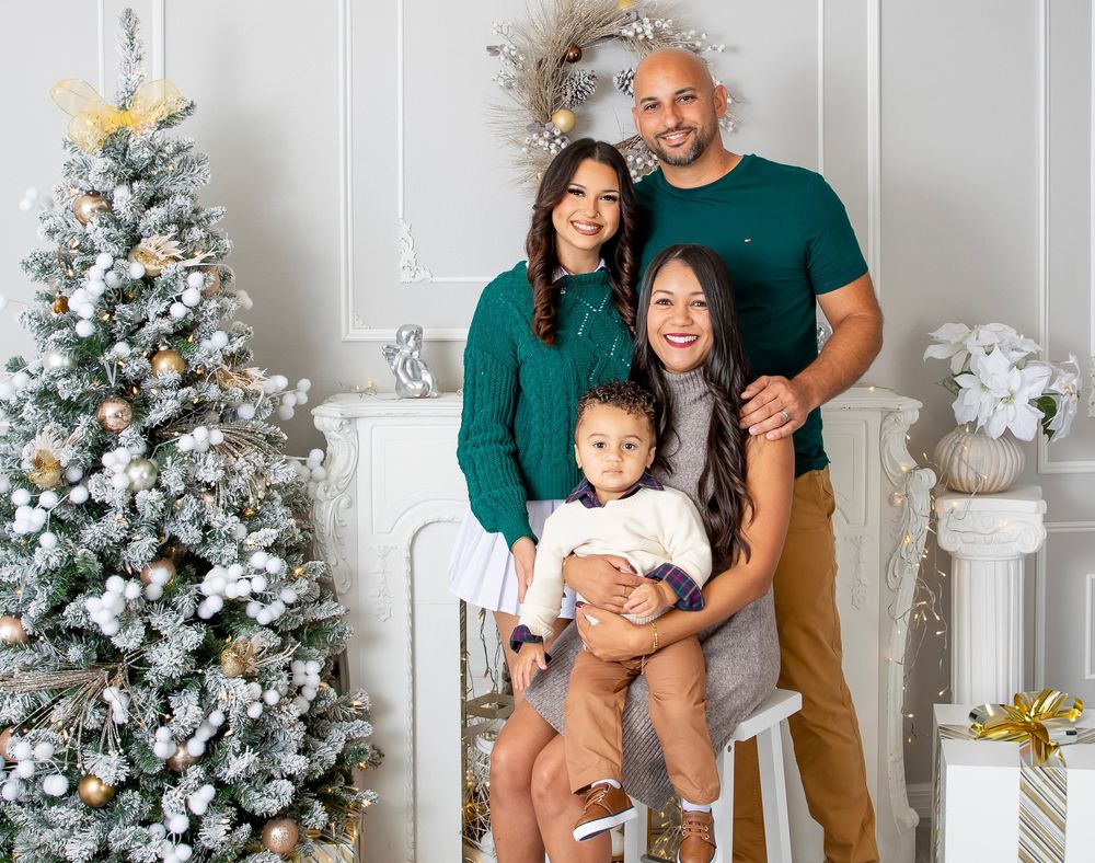 Family Holiday photoshoot: fireplace, beautiful Christmas setup, Christmas tree- stylish, modern, clean in Sarasota, Bradenton photo studio.