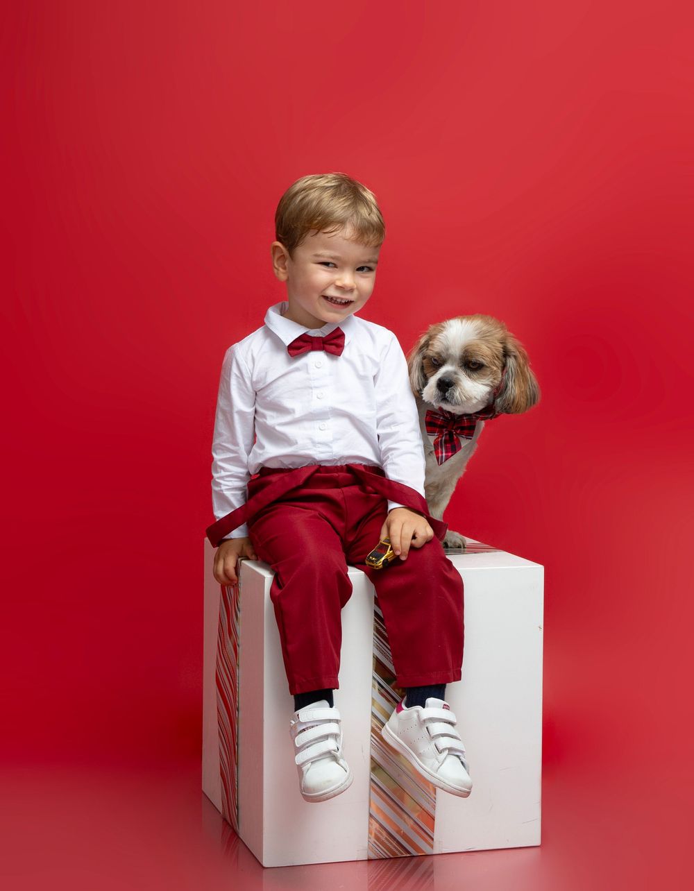 Kids Holiday photoshoot: fireplace, beautiful Christmas setup, Christmas tree- stylish, modern, clean in Sarasota, Bradenton photo studio.