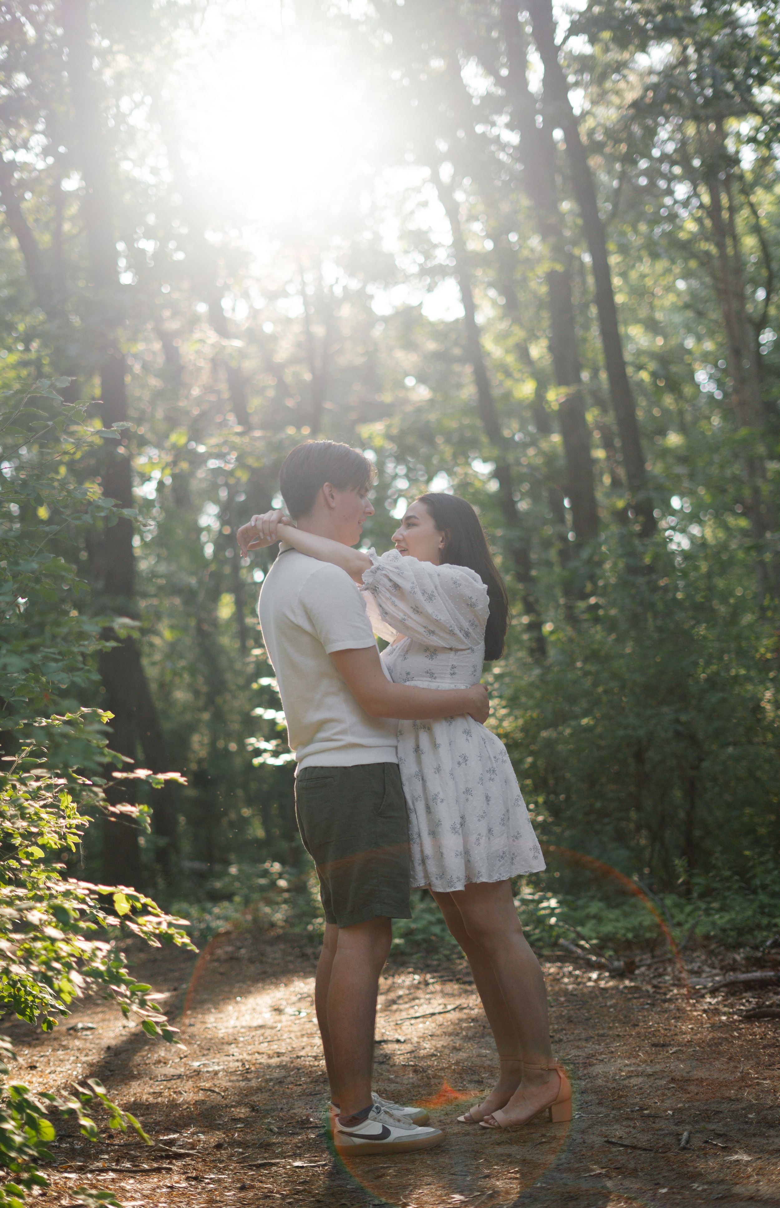 A couple embracing in the forest