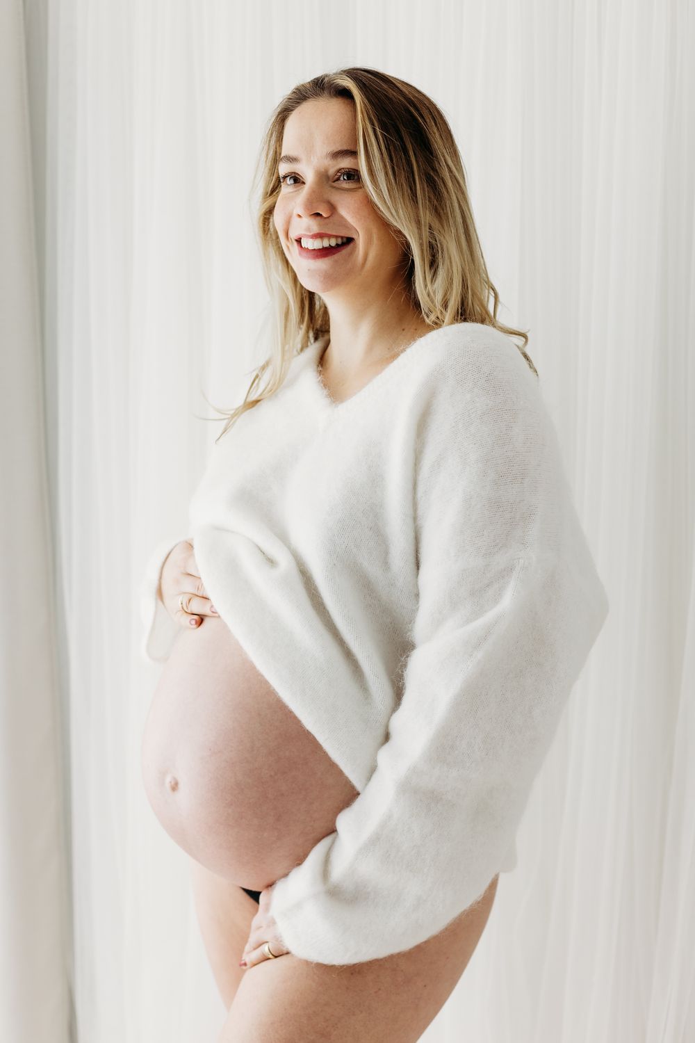 Pregnant mum photographed in Mapperley studio in Nottingham for a candid maternity photoshoot