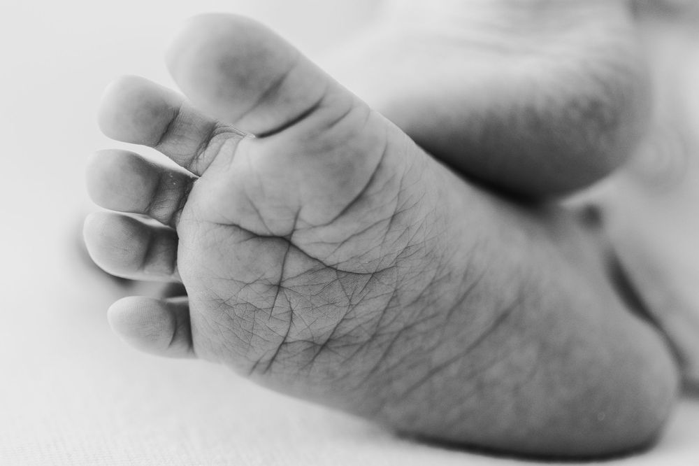 Macro of newborn baby mouth photographed in Mapperley studio in nottingham. timeless photography in nottingham photography studio