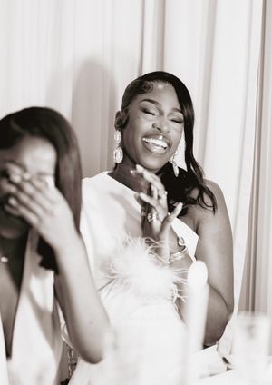 A series of black and white portraits showing joyful expressions and laughter in an artistic sequence.
