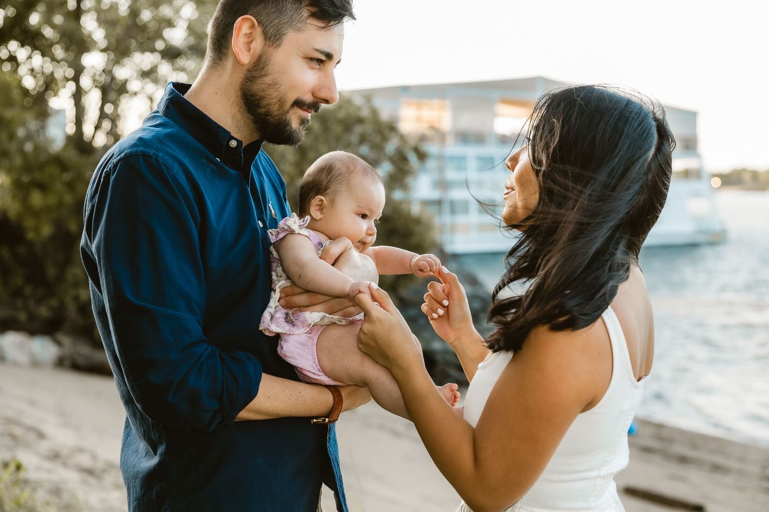 Gay Dads with children walk together during Brisbane family photo shoot