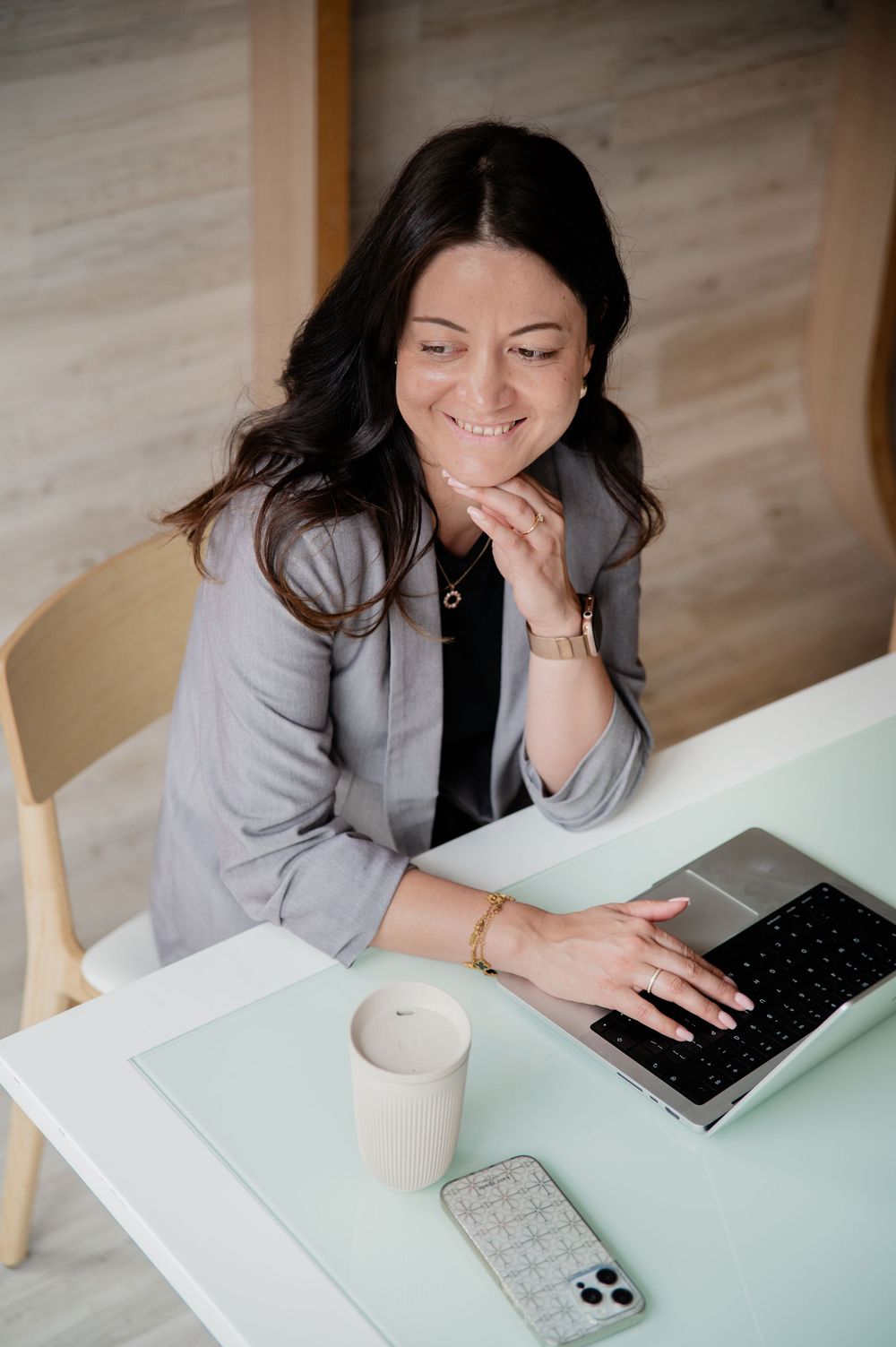 personal branding session in london office with woman on her laptop