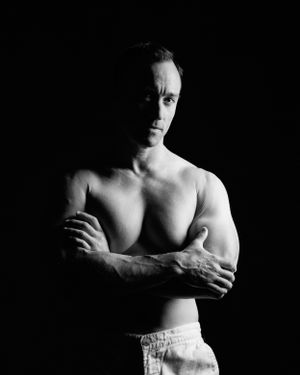 David G Holt Photography - Artistic black and white male torso study with dramatic lighting.