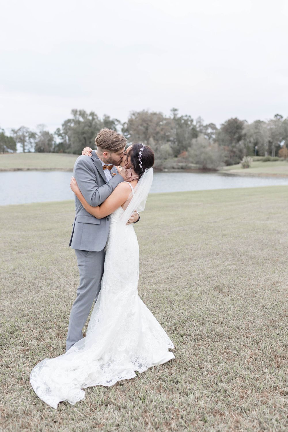 bride and groom kiss