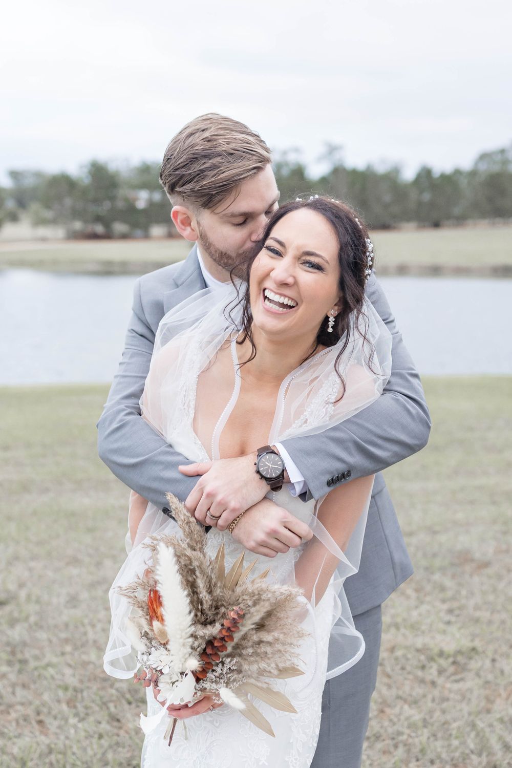 bride and groom laugh