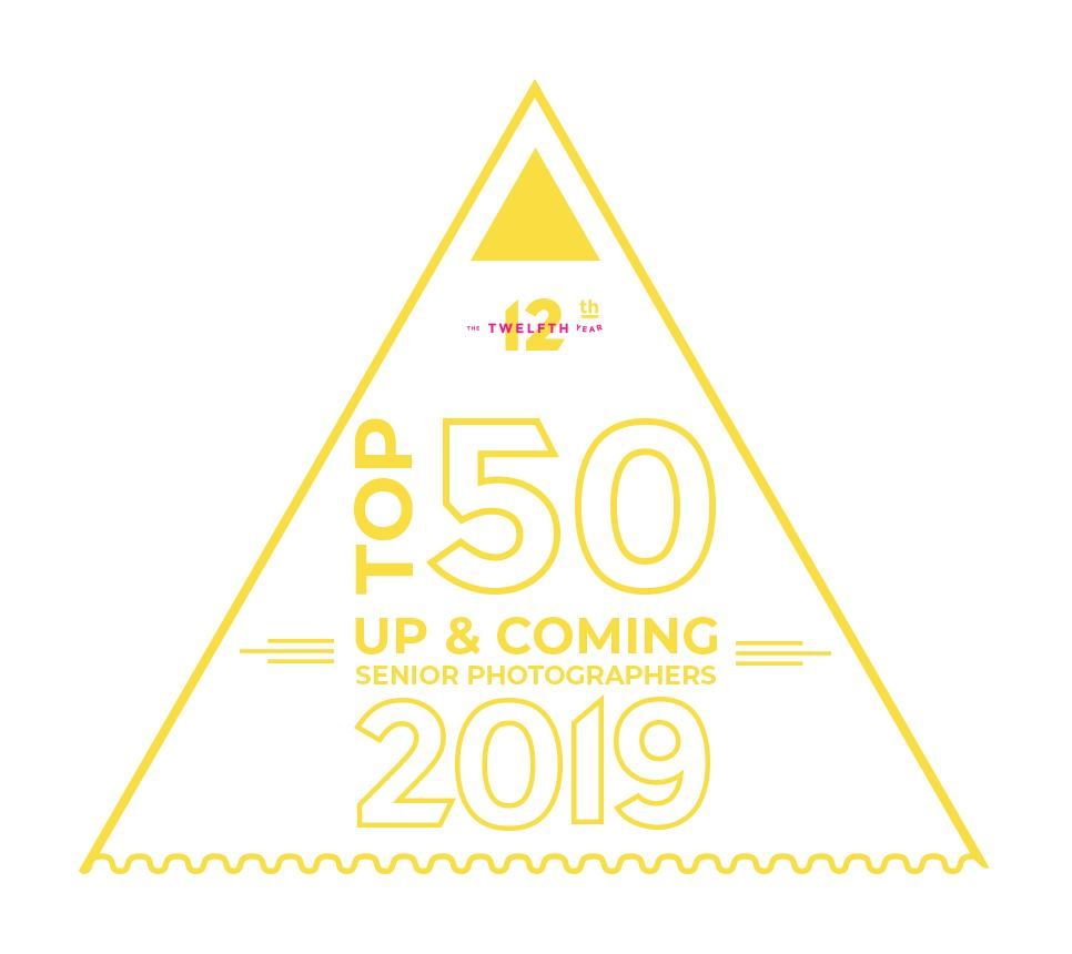 Yellow triangular design announcing Top 50 Up & Coming photographers of 2019.