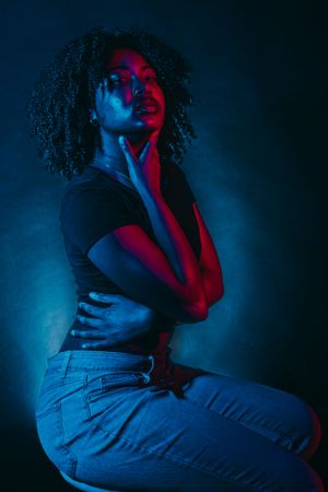 Expressive portrait series with moody lighting showcasing graceful movement and emotion.