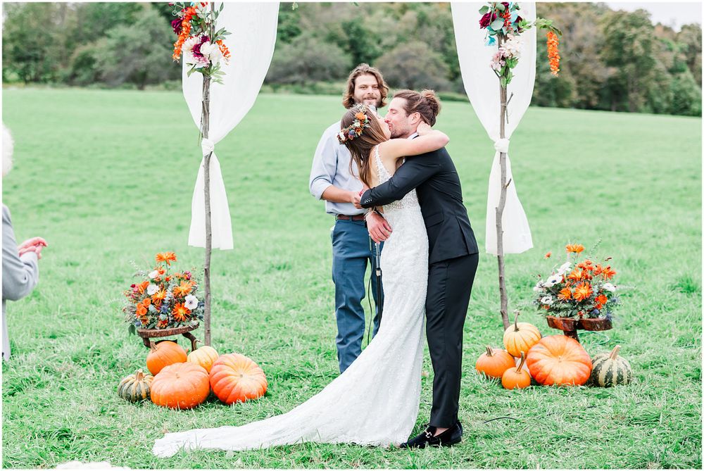 Poconos wedding photographer Fall wedding first kiss
