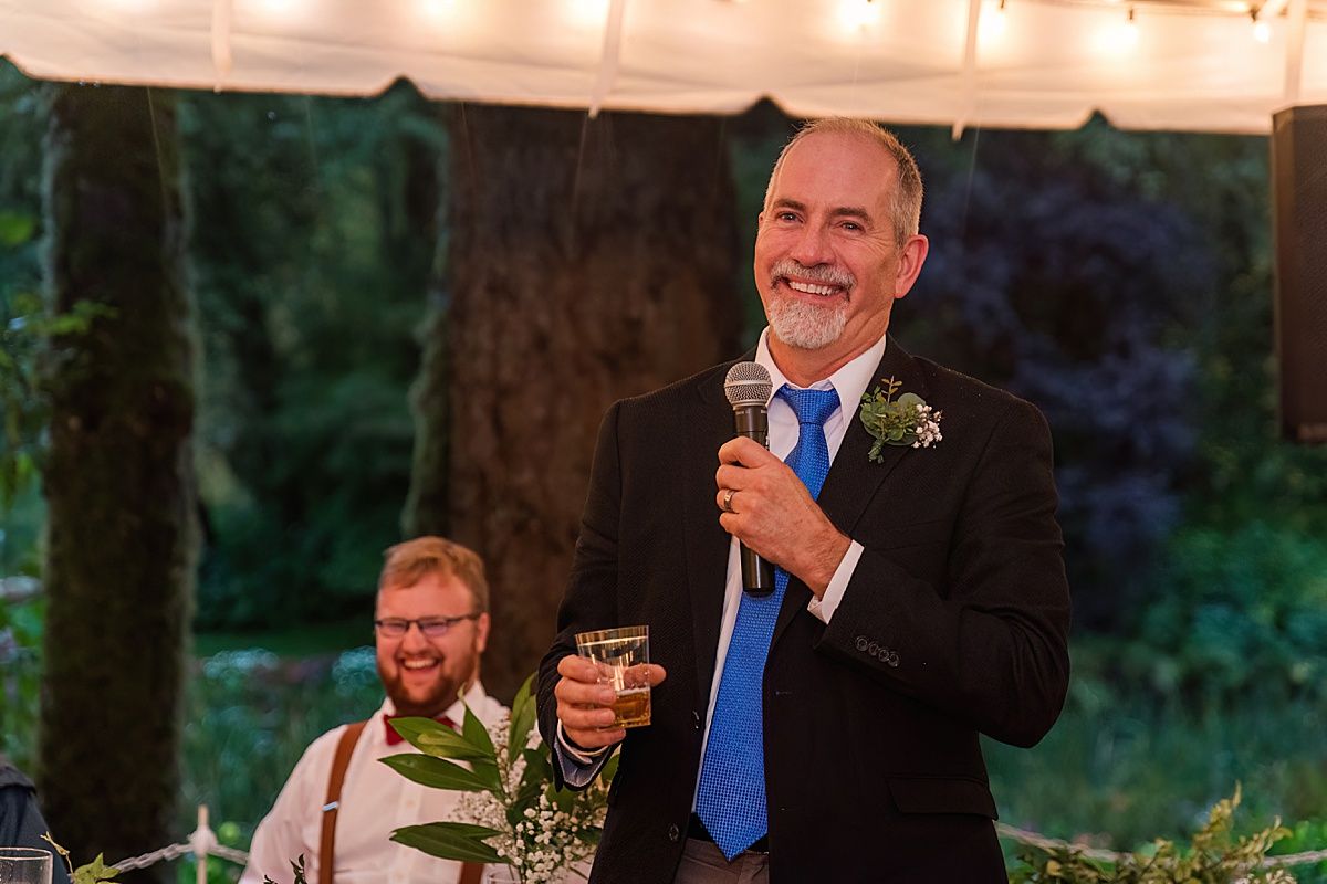 Photograph of father of the groom at wedding reception