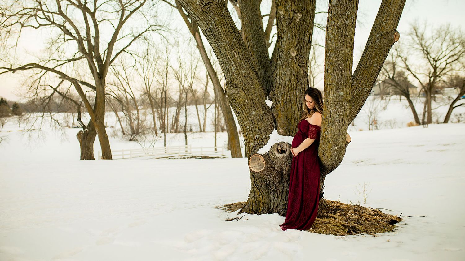 Snowy Winter Maternity Photo Session in Bennington, NE - BrightSide Photography