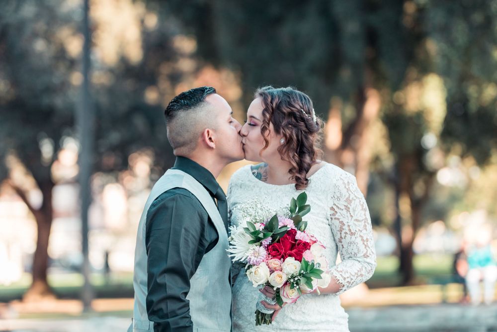 Wedding day portrait of groom and bride in natural light in Fresno, California