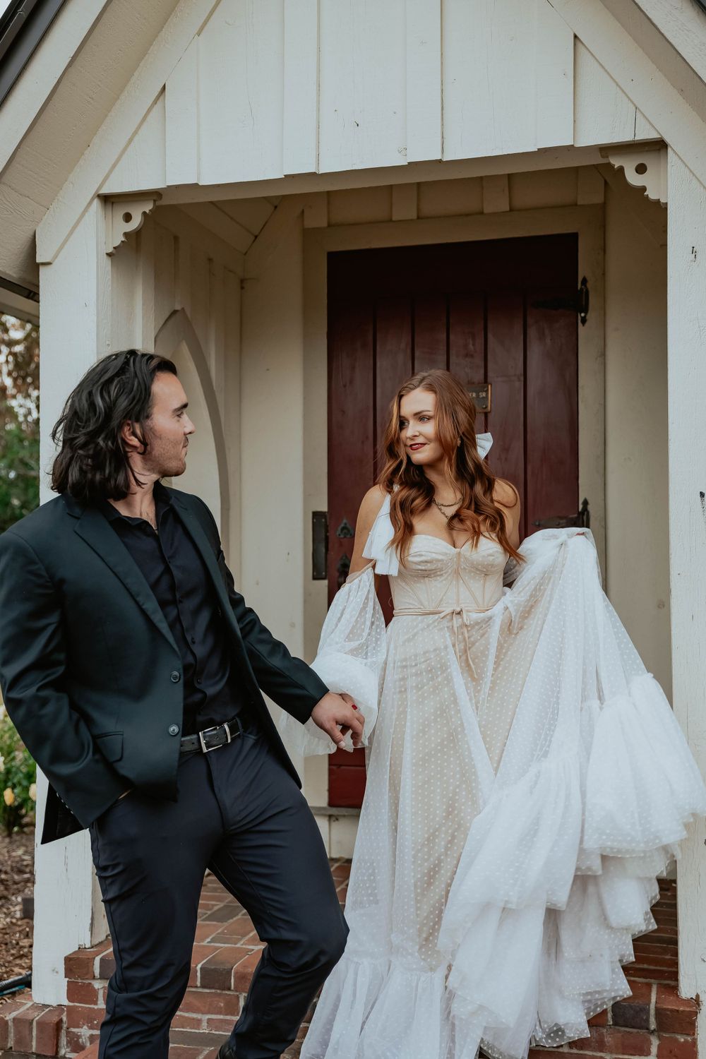 A playful wedding photoshoot sequence showing a couple dancing and twirling with a white dress on a porch.
