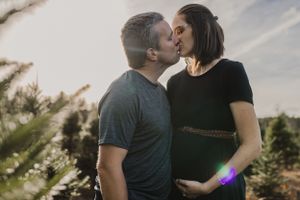 Sunset maternity session at Kevin Veinotte's U-Cut Christmas Tree farm in Bridgewater, Nova Scotia