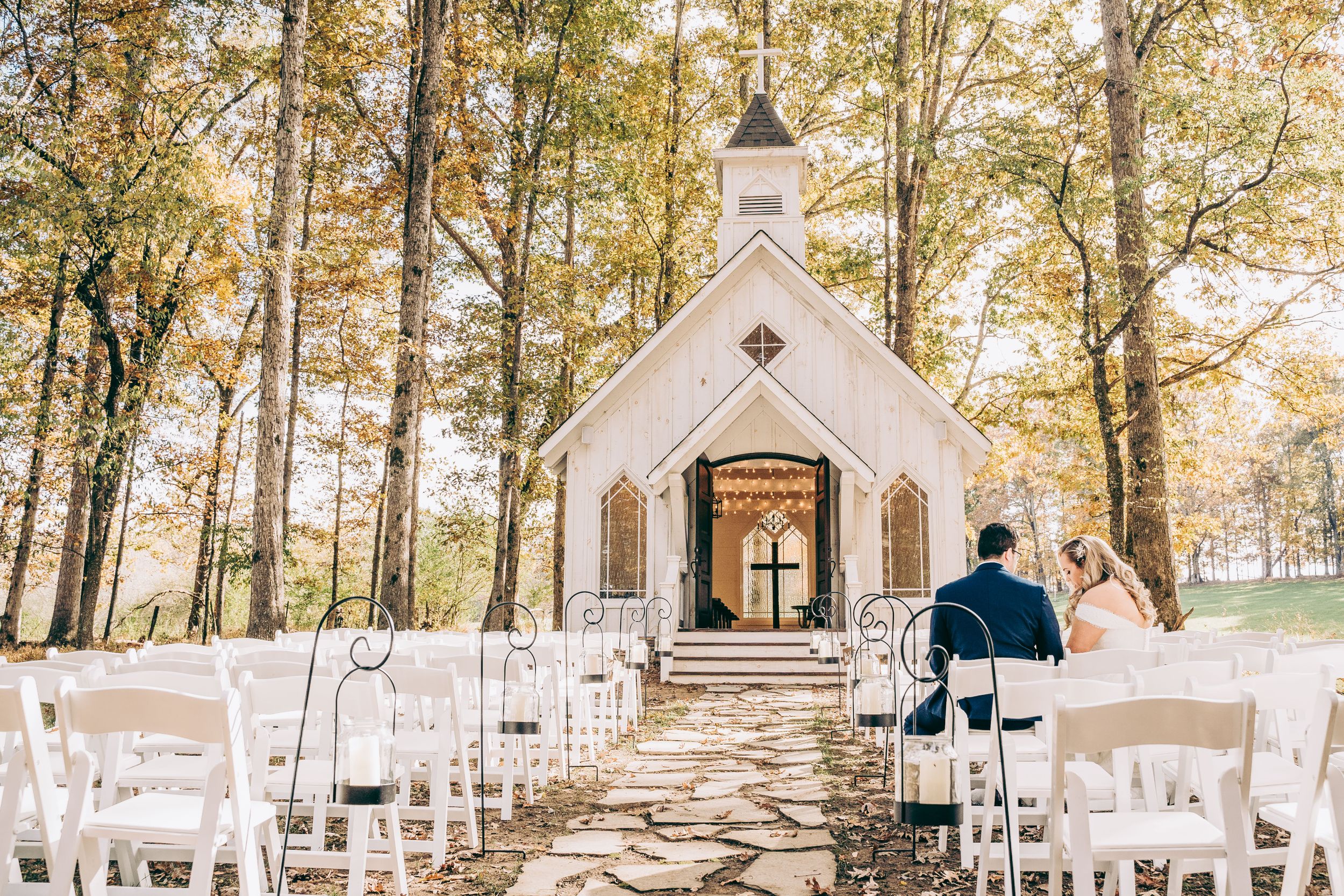 Couple shares a private moment before their ceremony at the chapel at Conley Creek Events