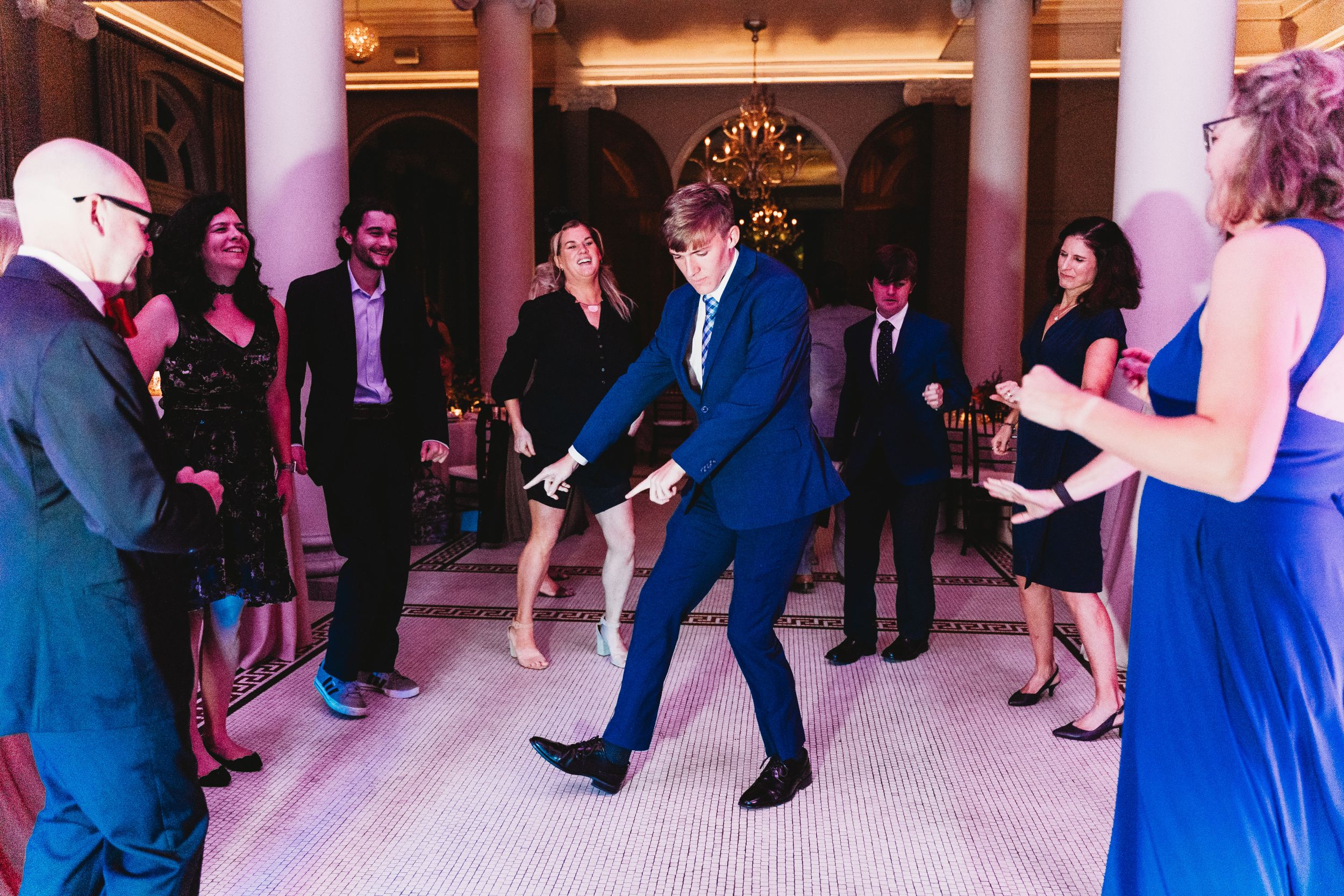 Foot loose and fancy free guest busting a move at a wedding reception at Georgian Hall in Athens Georgia