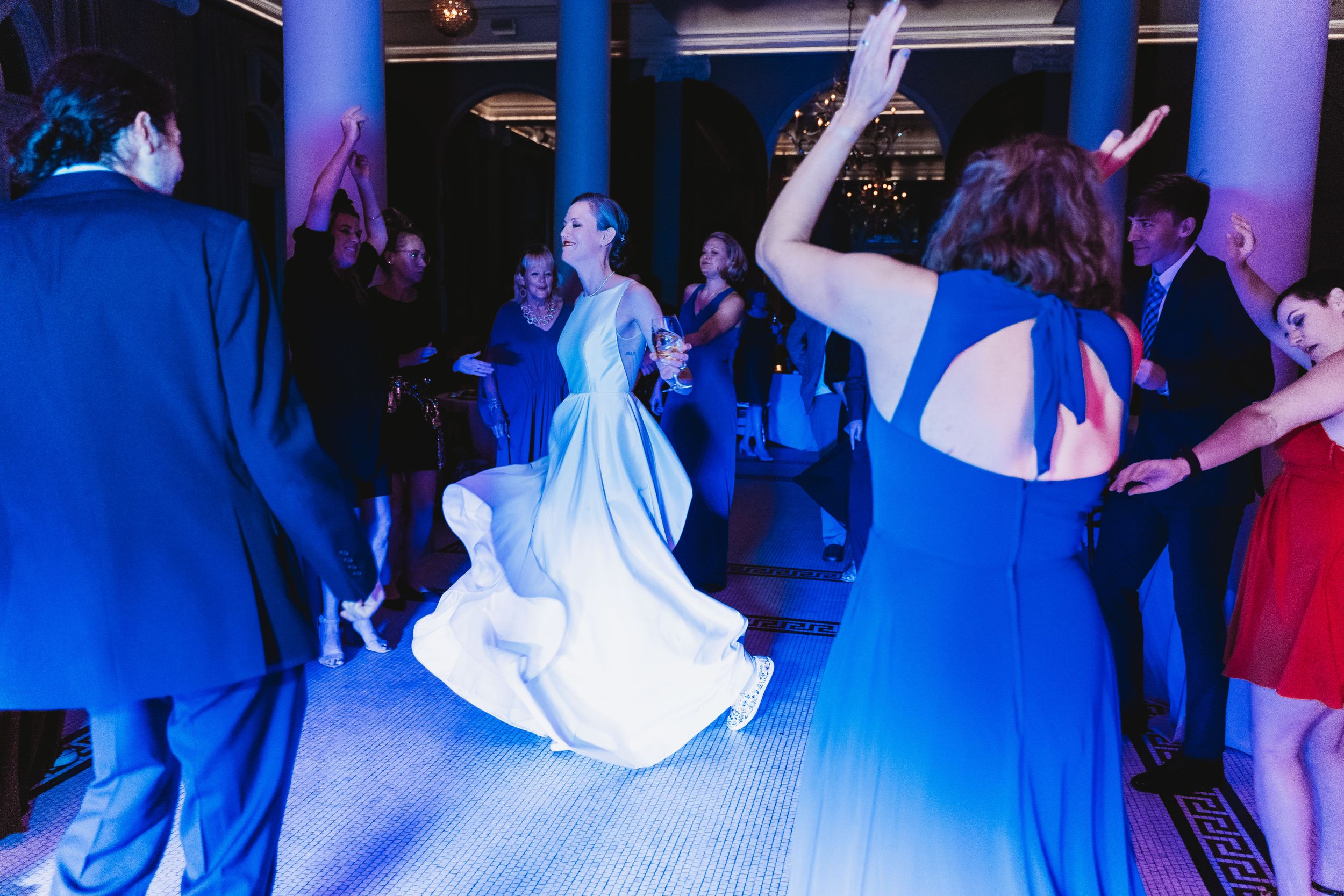 Bride dancing at the Georgian Hall during her wedding reception in Athens, GA