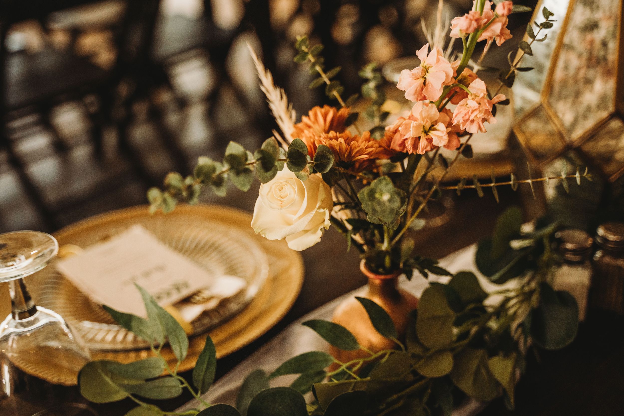 Wedding details on table before reception at RLM Affairs Estate Room in Gainesville, GA