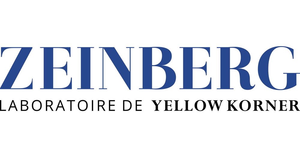 Blue text logo for Zeinberg Laboratoire de Yellow Korner against white background.