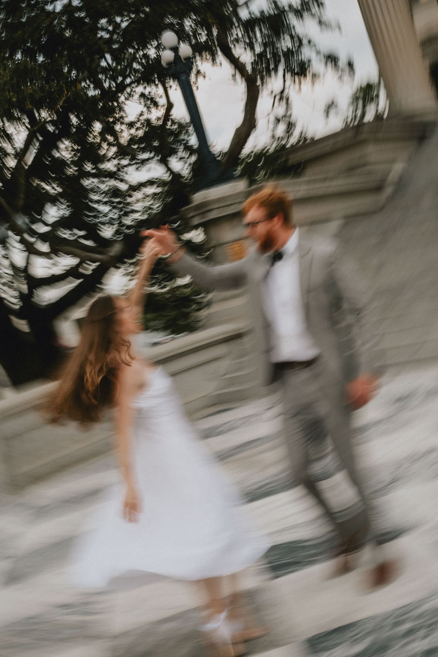 A motion blur photo of a couple dancing