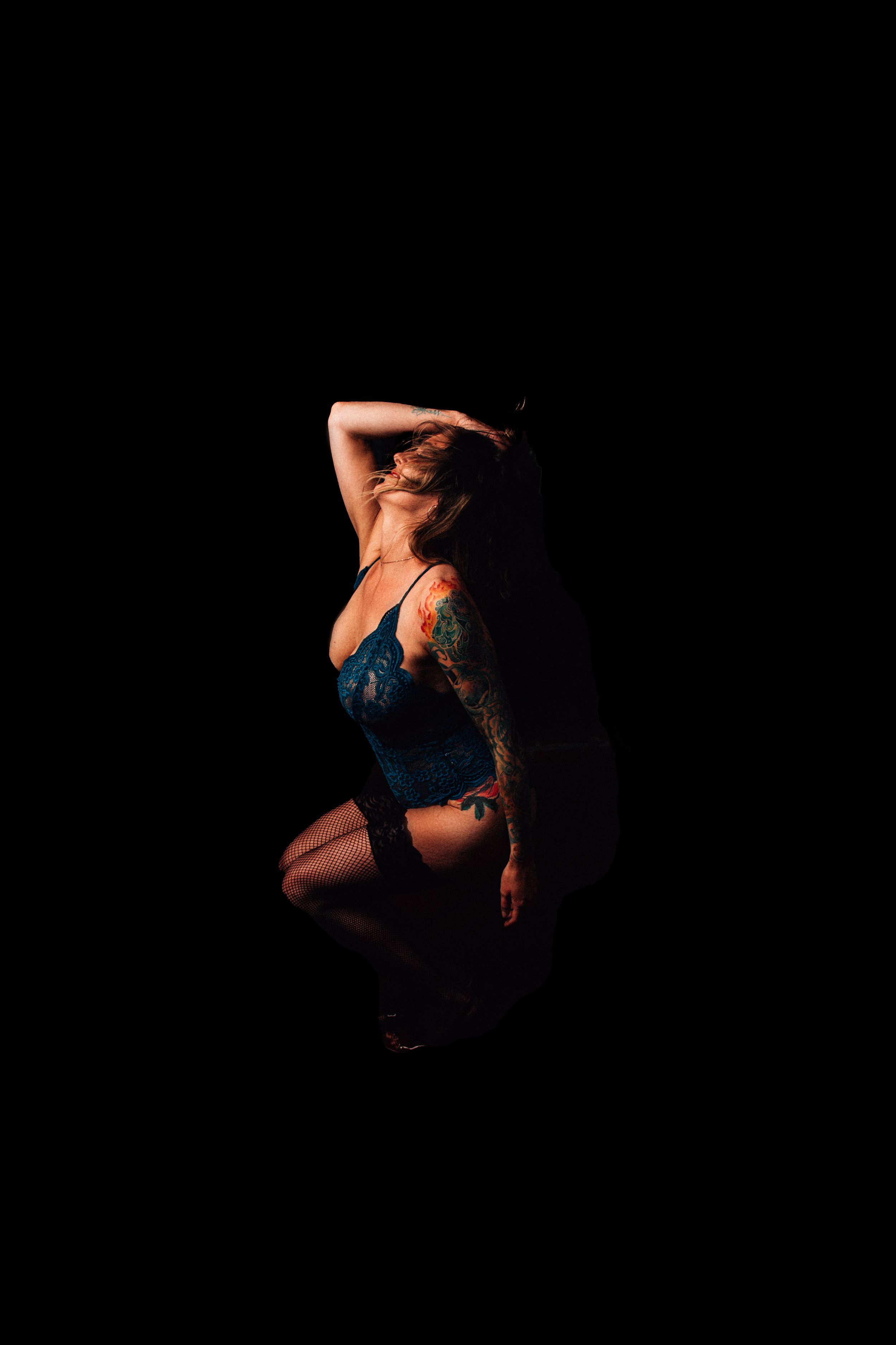 Las Cruces Boudoir Photographer woman in lingerie dancing